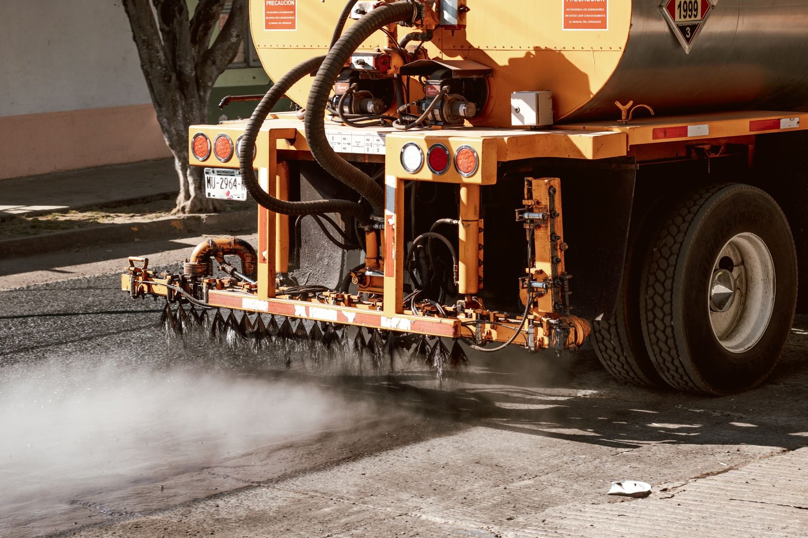County truck conducting overnight ultra-low volume mosquito fogging on a residential road south of Argyle