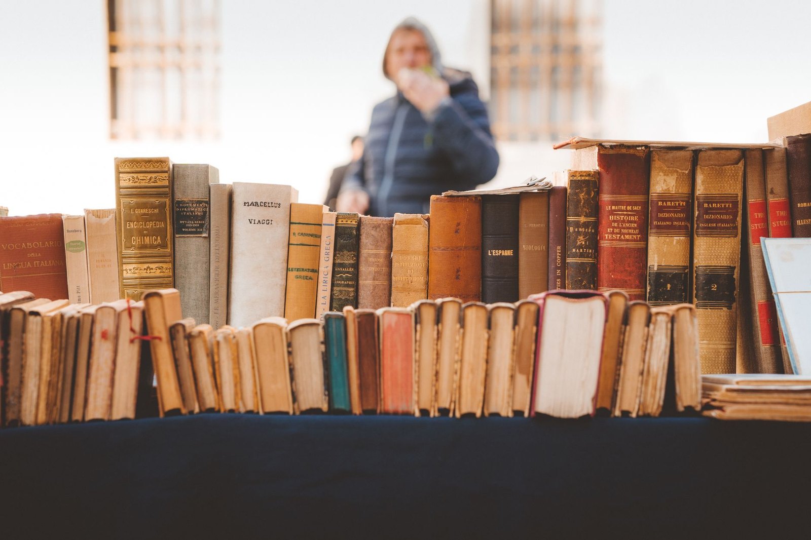 Tables lined with used books at a Friends of the Library book sale