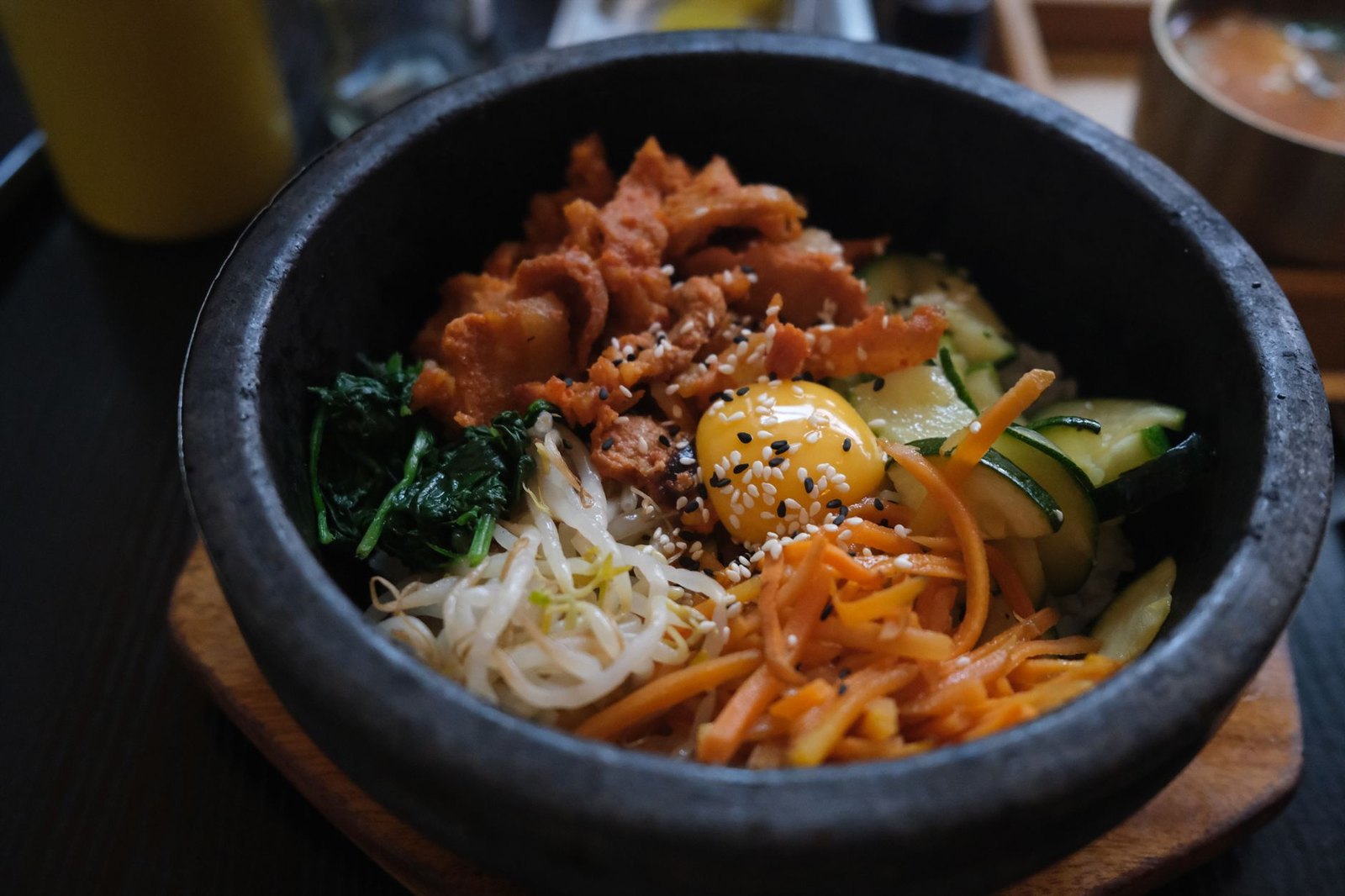 Sizzling dolsot bibimbap served in a hot stone bowl, the dish the restaurant is named after