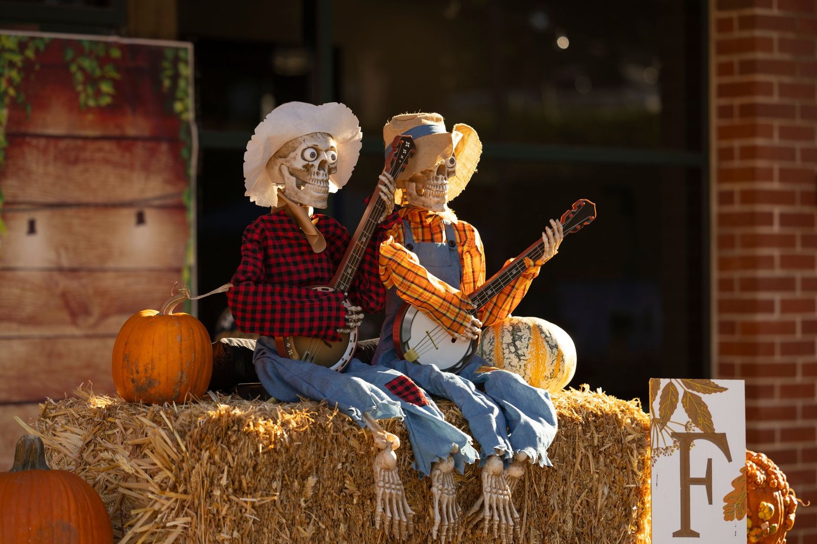 Outdoor fall festival with hay maze and live music stage