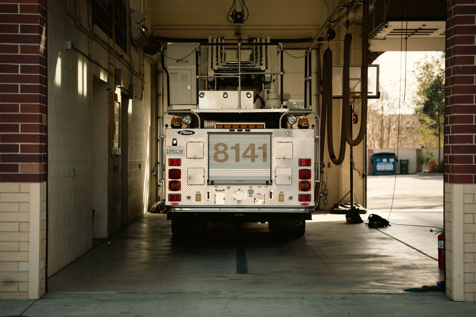 Fire truck outside a community fire station, representing Station 6's permanent facility