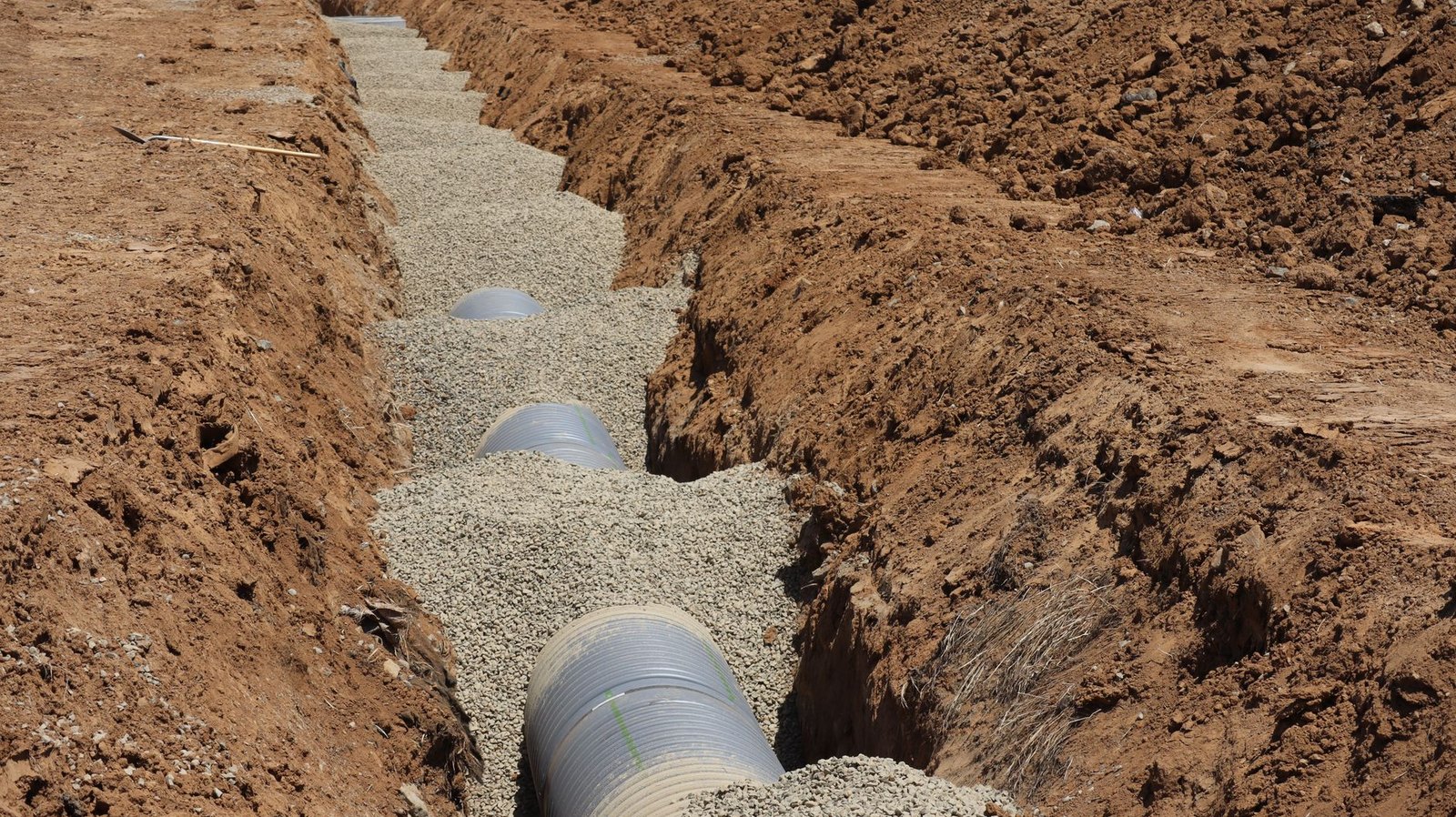 Residential street water line replacement construction trench