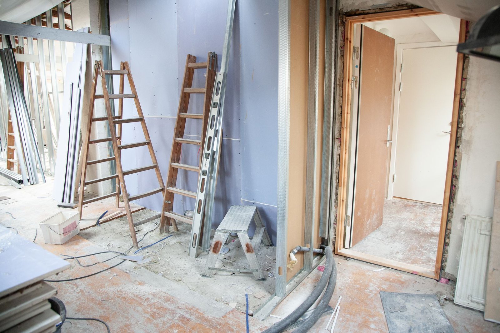 Interior office space mid-renovation showing framing and construction work