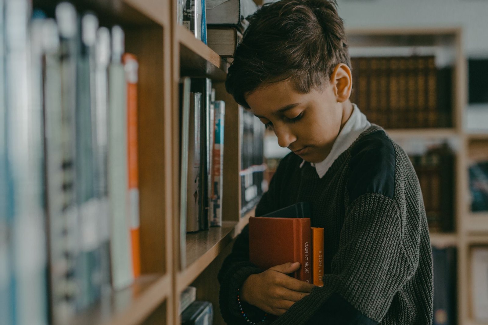 School library books shelves students browsing