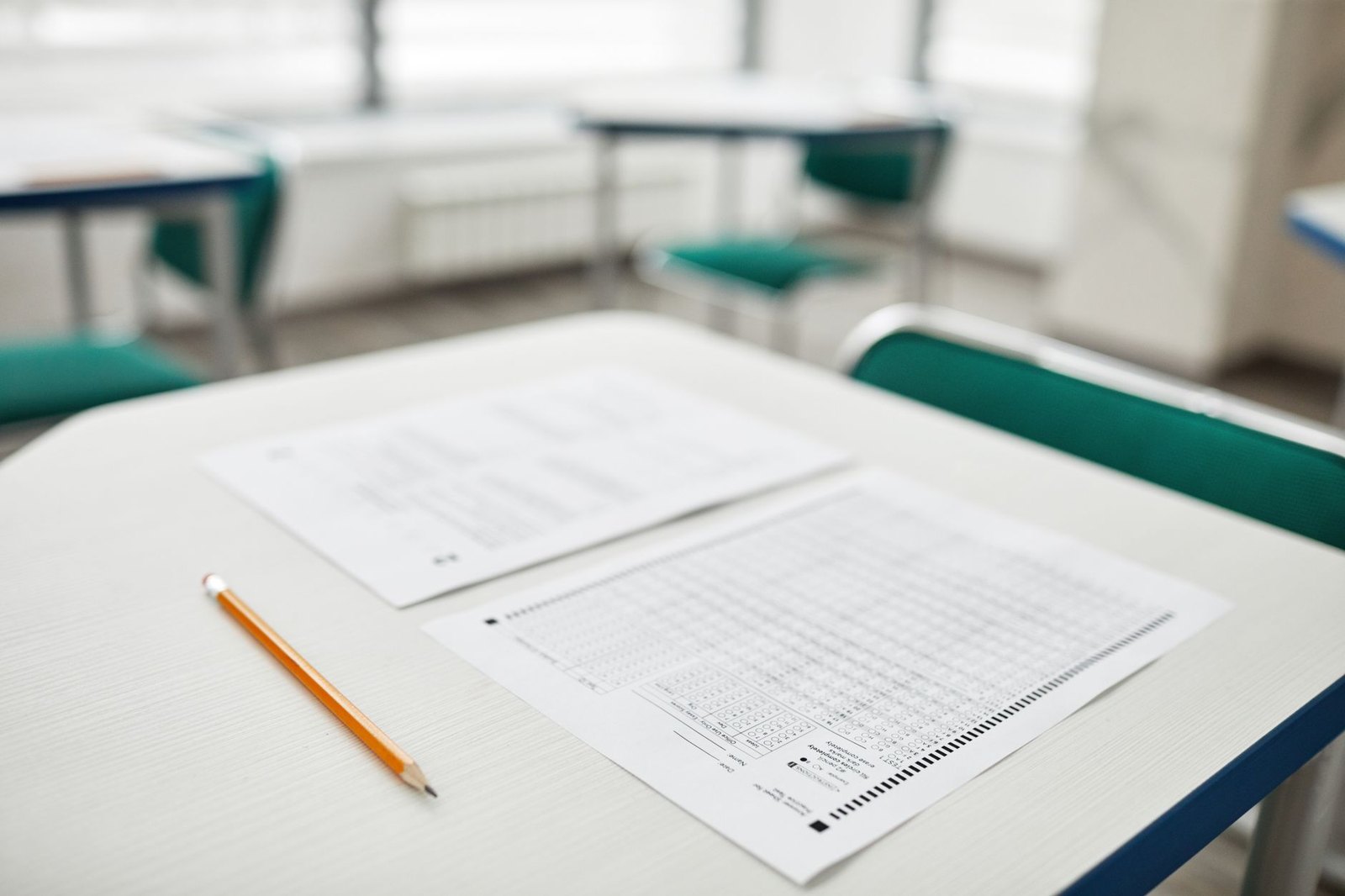 Elementary school students sitting at desks taking a standardized test