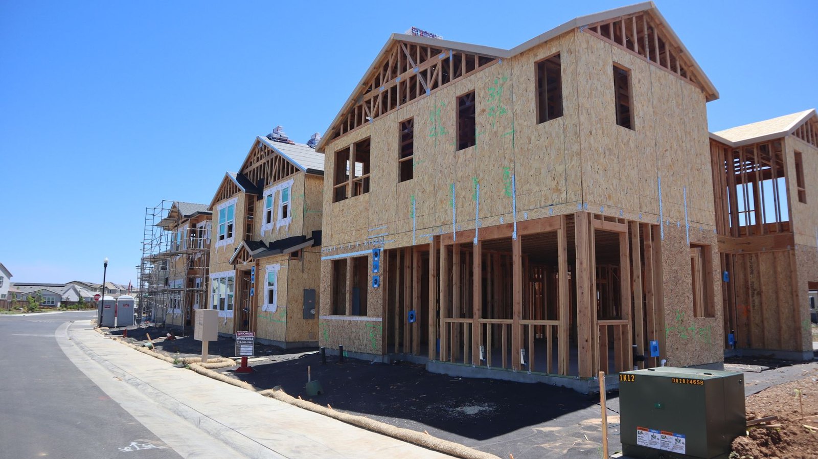 Multi-story wood-frame apartment buildings under construction in western Flower Mound near Cross Timbers Road and Highway 377