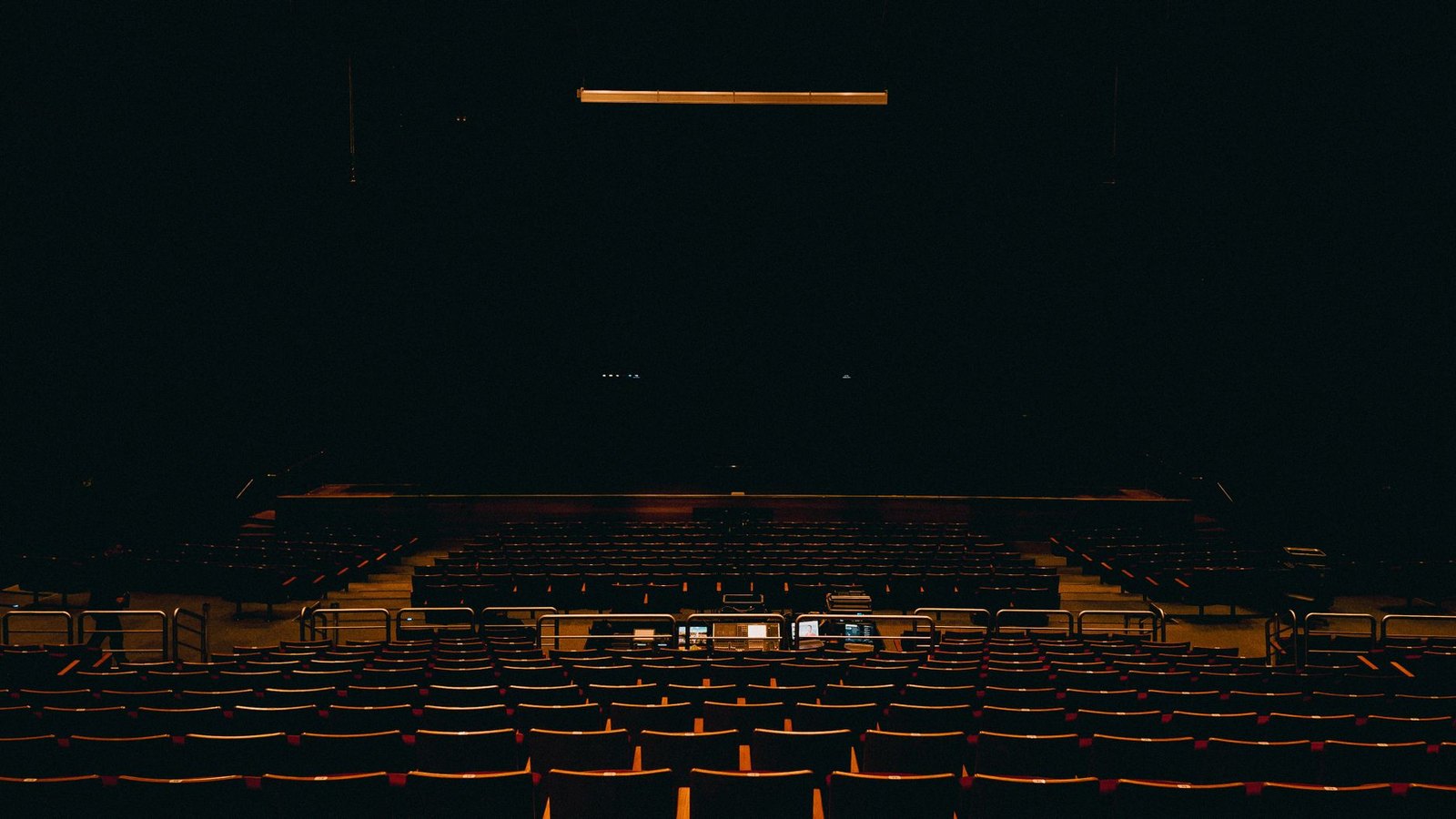 Interior of a performing arts theater with stage and seating — the type of main-stage venue planned for Flower Mound