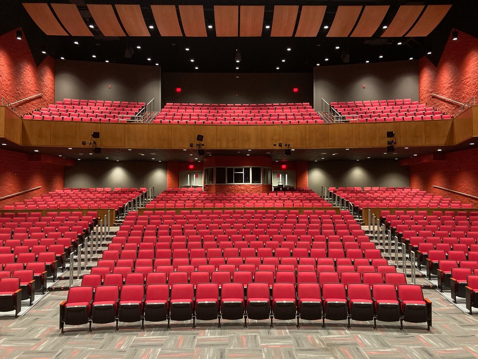 Interior of a community performing arts theater with main stage and tiered seating