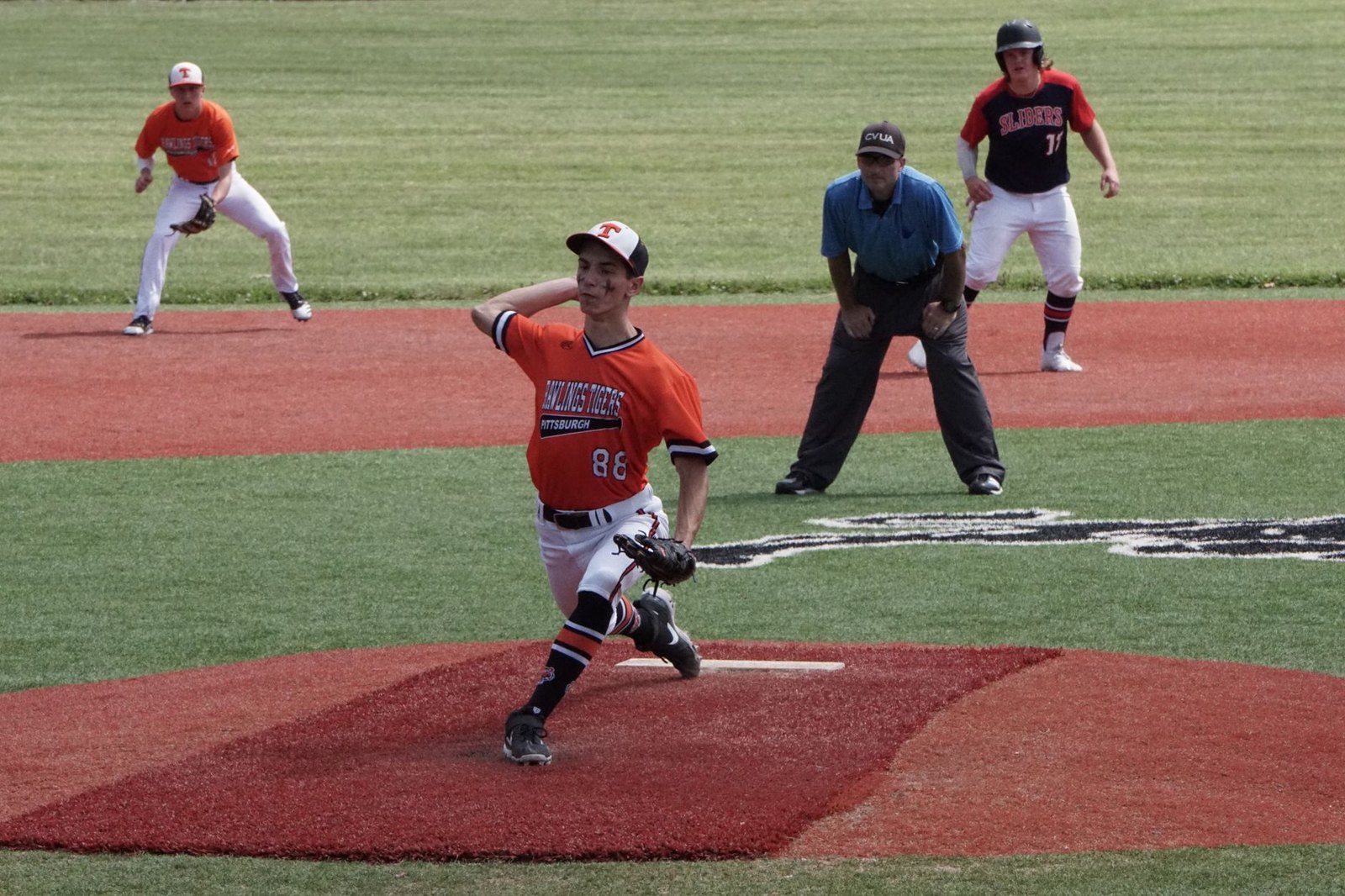 Marcus Marauders pitcher winding up during a UIL playoff game