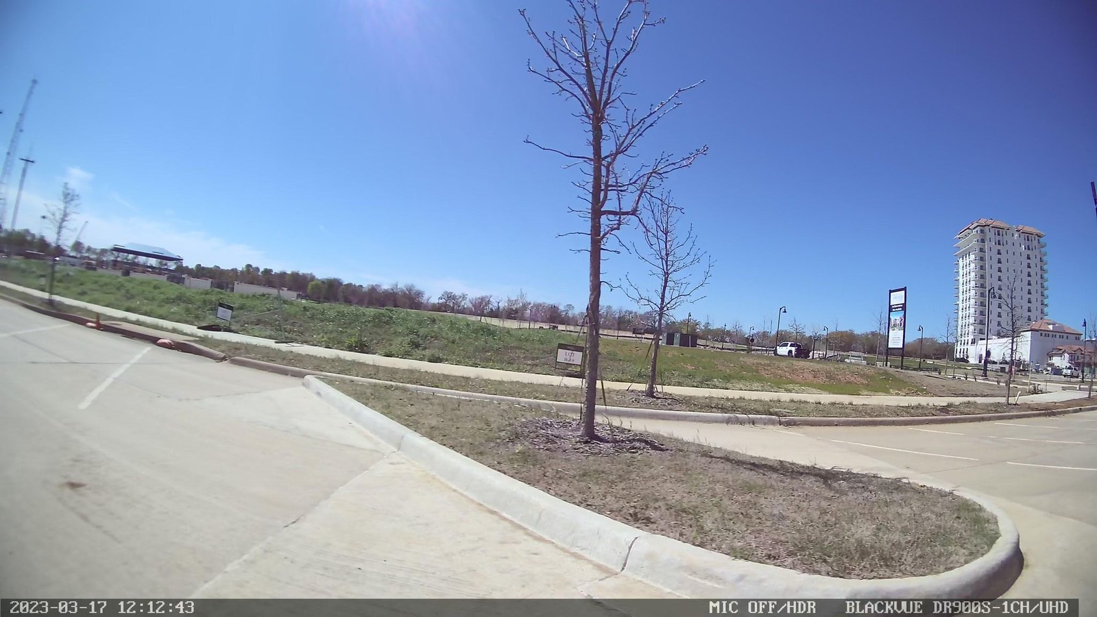 Thirty-One Eleven Sunset, the 16-story luxury residential tower at Lakeside Village in southeast Flower Mound, viewed from the Lake Grapevine shoreline