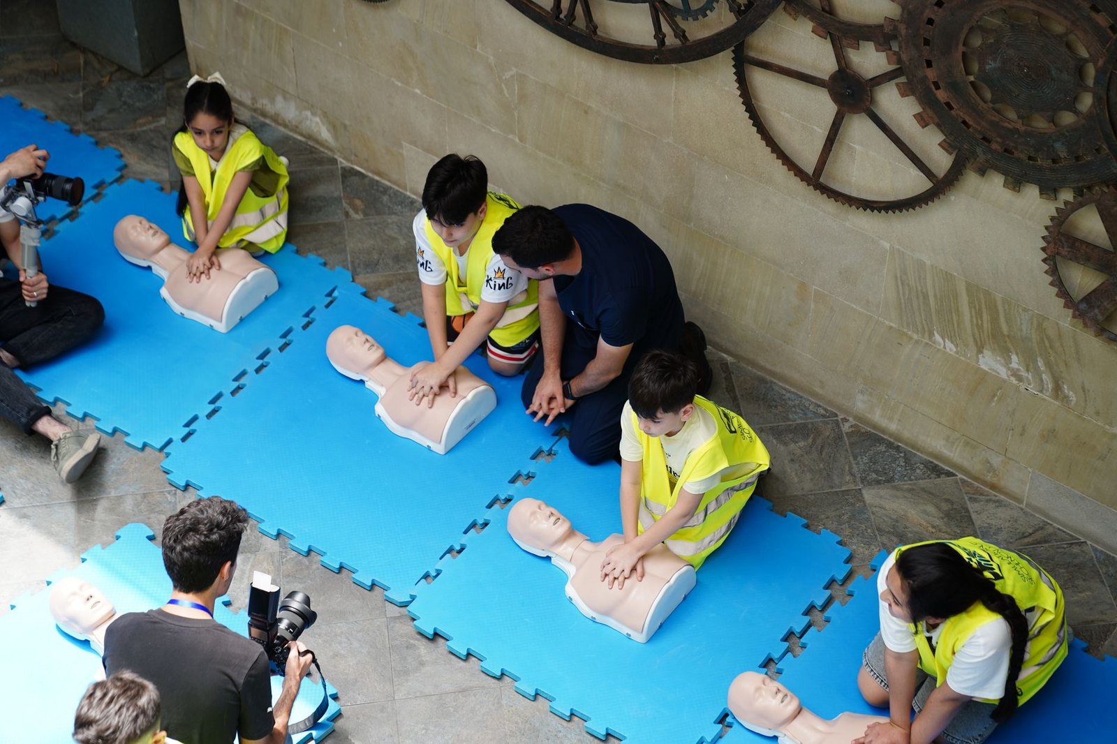 Teen learning hands-only CPR training