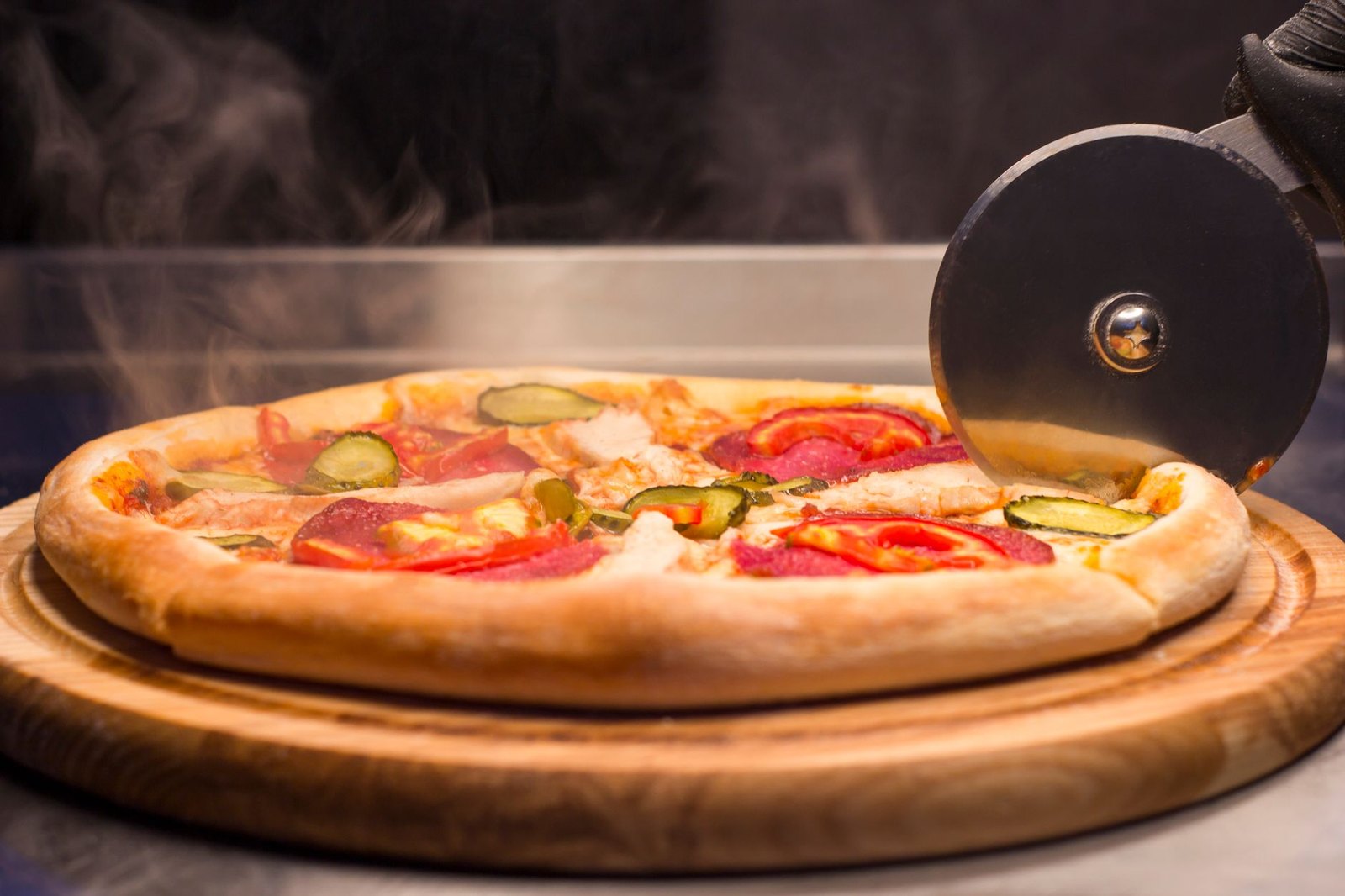 A wood-fired pizza fresh from the oven on a wooden serving board